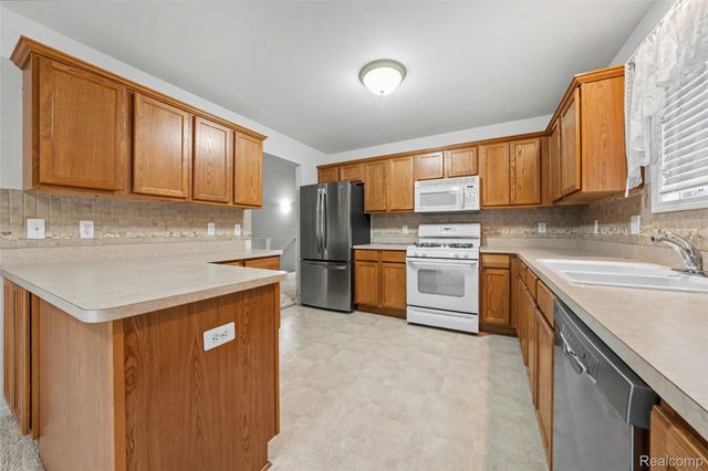45467 Coachfort Drive, Macomb Township, MI 48044