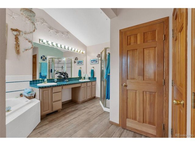 915 N Bluff Dr, Franktown, CO 80116