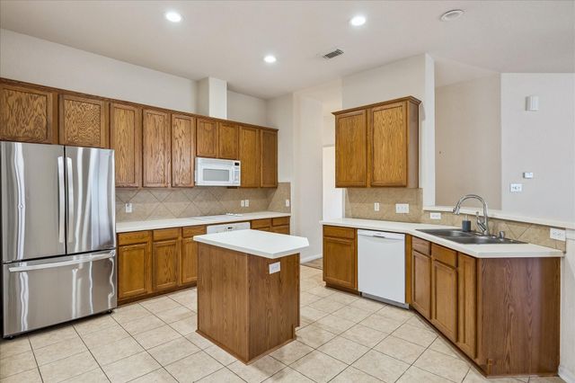 19403 Valiant Woods Drive, Spring, TX 77379