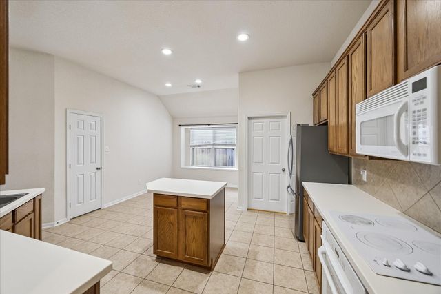 19403 Valiant Woods Drive, Spring, TX 77379