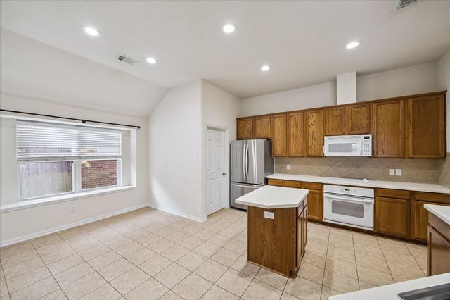 19403 Valiant Woods Drive, Spring, TX 77379