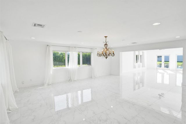 26 Cayuga Road, Sea Ranch Lakes, FL 33308