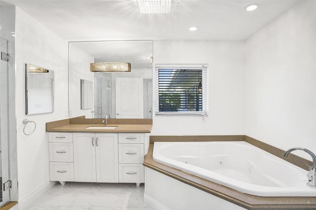 26 Cayuga Road, Sea Ranch Lakes, FL 33308