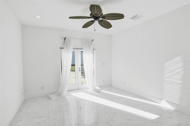 26 Cayuga Road, Sea Ranch Lakes, FL 33308