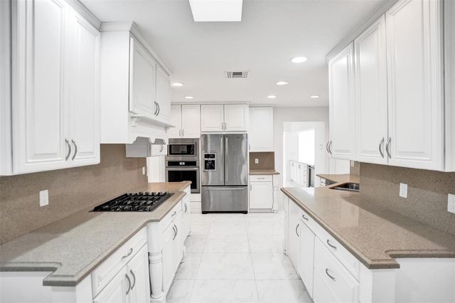 26 Cayuga Road, Sea Ranch Lakes, FL 33308