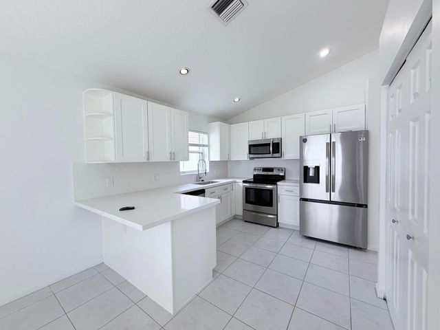 1975 Oak Berry Circle, Wellington, FL 33414