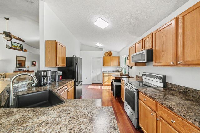 9450 WATER ORCHID AVE, Clermont, FL 34711