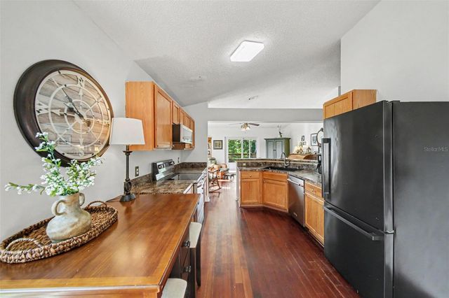 9450 WATER ORCHID AVE, Clermont, FL 34711