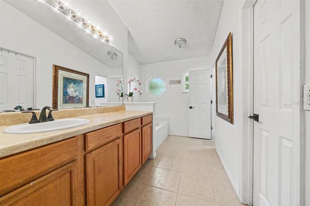 9450 WATER ORCHID AVE, Clermont, FL 34711