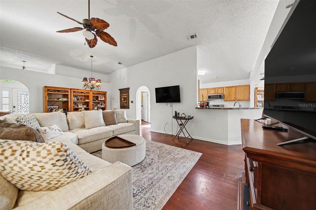 9450 WATER ORCHID AVE, Clermont, FL 34711