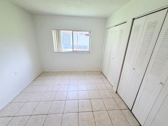 1089 N BENOIST FARMS Road 102, West Palm Beach, FL 33411