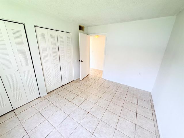 1089 N BENOIST FARMS Road 102, West Palm Beach, FL 33411
