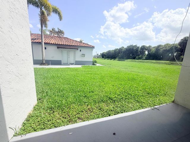 1089 N BENOIST FARMS Road 102, West Palm Beach, FL 33411