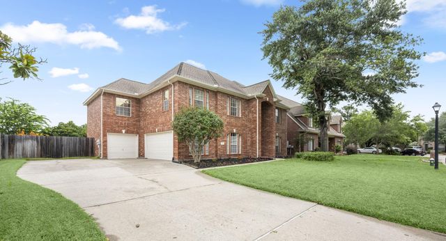 9514 Champions Cove Drive, Spring, TX 77379