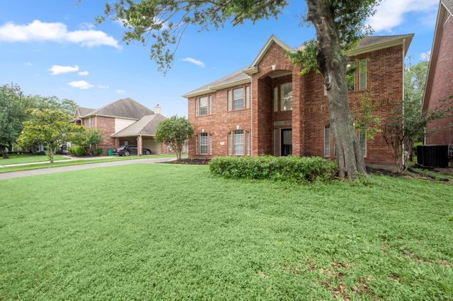 9514 Champions Cove Drive, Spring, TX 77379