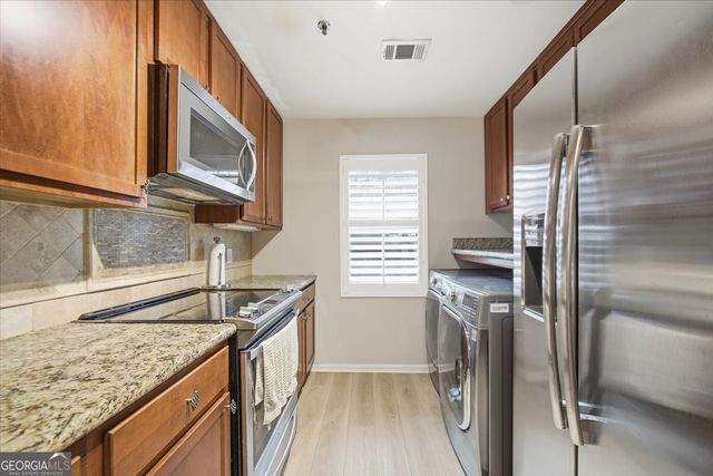 115 WINDING RIVER Drive UNIT B, Atlanta, GA 30350