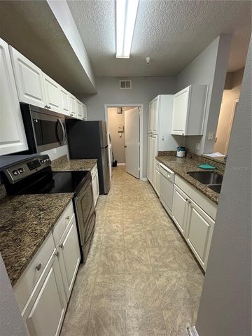 5542 METROWEST BOULEVARD 7-104, Orlando, FL 32811