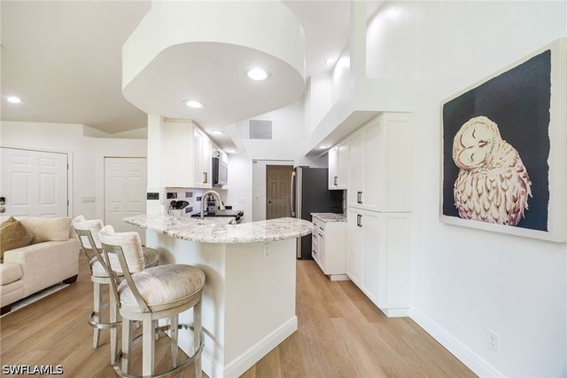 792 Eagle Creek DR 203, Naples, FL 34113