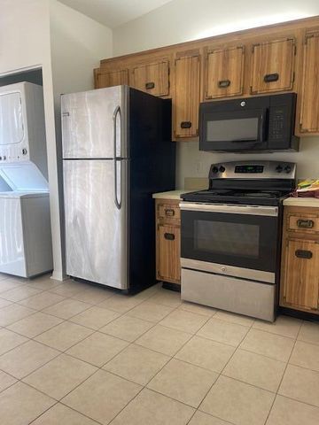 705 Sunny Pine Way F, Greenacres, FL 33415