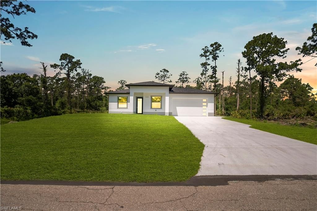 1009 Moore AVE, LEHIGH ACRES, FL 33972 — exterior