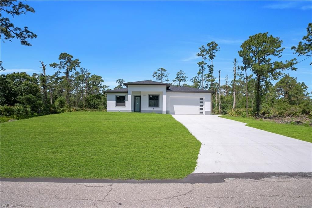 1009 Moore AVE, LEHIGH ACRES, FL 33972 — photo 2
