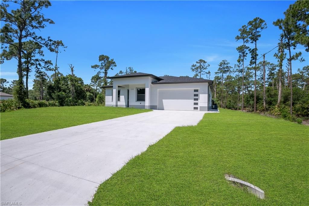 1009 Moore AVE, LEHIGH ACRES, FL 33972 — photo 3