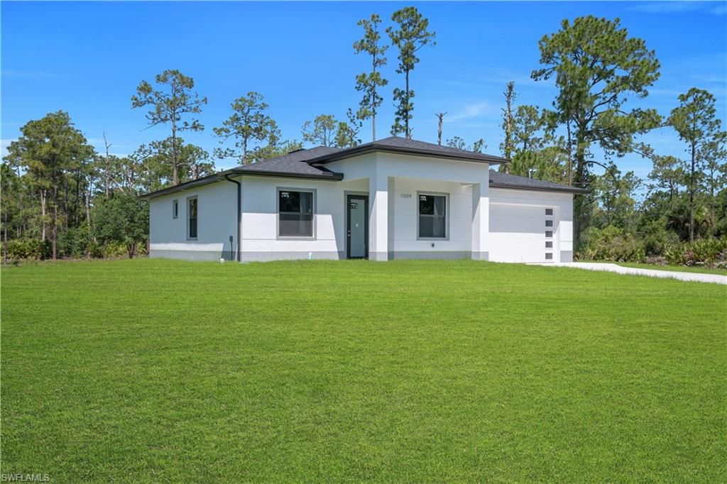 1009 Moore AVE, LEHIGH ACRES, FL 33972 — photo 4