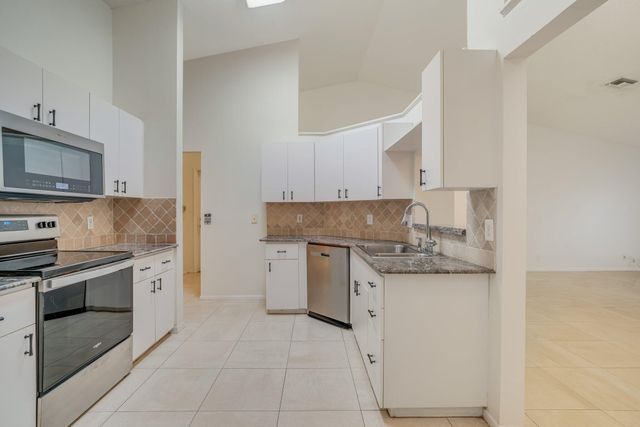 6209 Pond Tree Court, Greenacres, FL 33463