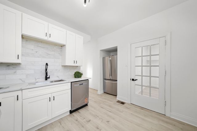 7545 S Merrill Avenue, Chicago, IL 60649