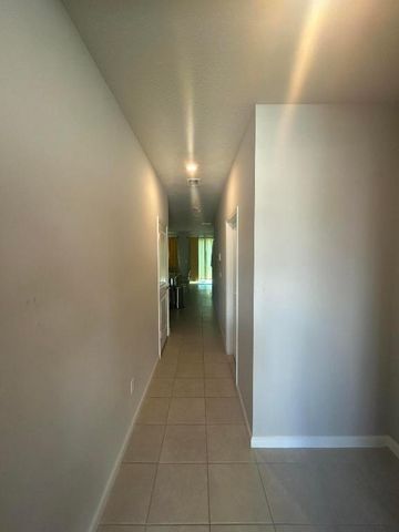 5630 N Enclave Drive, Mangonia Park, FL 33407