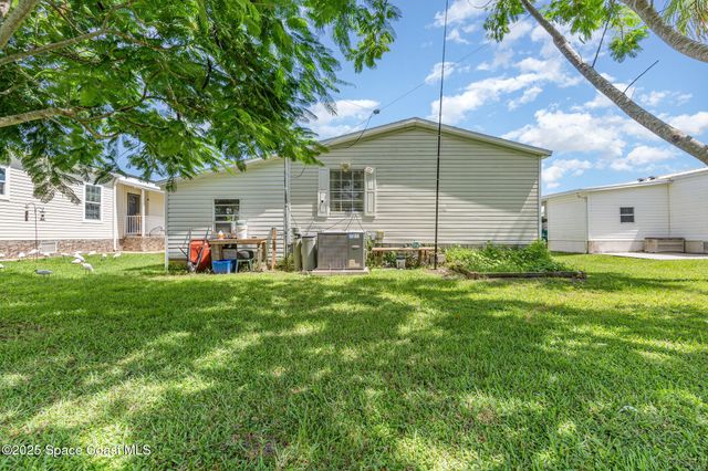 1115 Barefoot Circle, Barefoot Bay, FL 32976