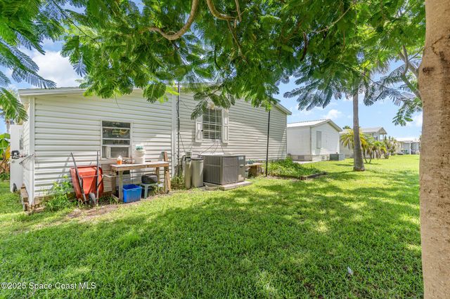 1115 Barefoot Circle, Barefoot Bay, FL 32976