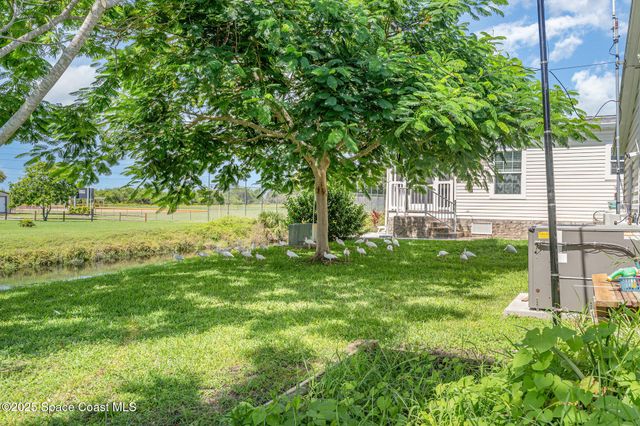 1115 Barefoot Circle, Barefoot Bay, FL 32976