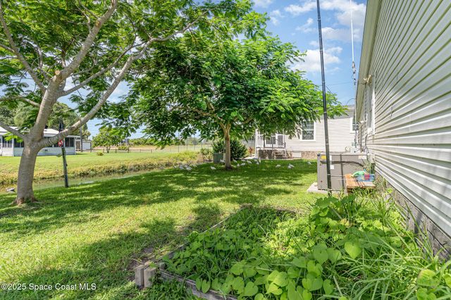 1115 Barefoot Circle, Barefoot Bay, FL 32976