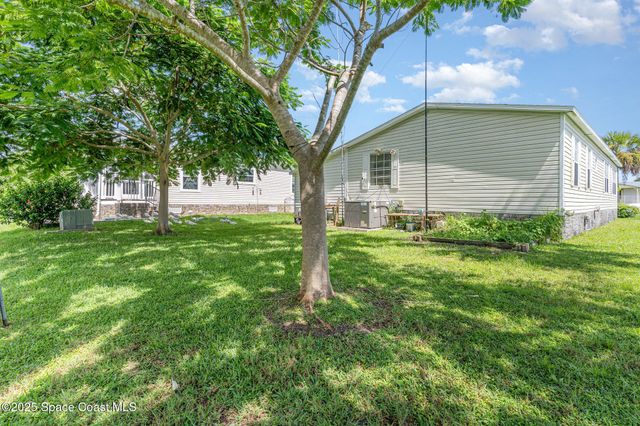 1115 Barefoot Circle, Barefoot Bay, FL 32976