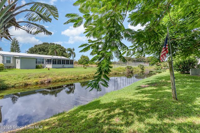 1115 Barefoot Circle, Barefoot Bay, FL 32976