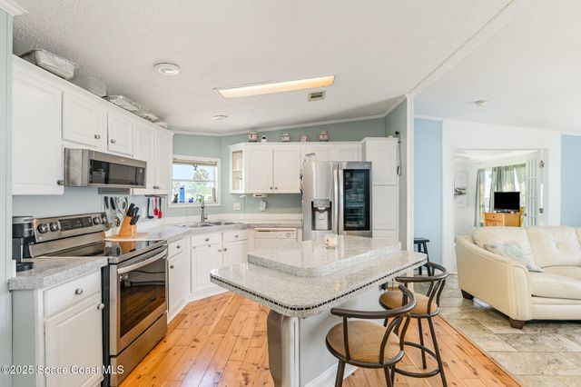 1115 Barefoot Circle, Barefoot Bay, FL 32976