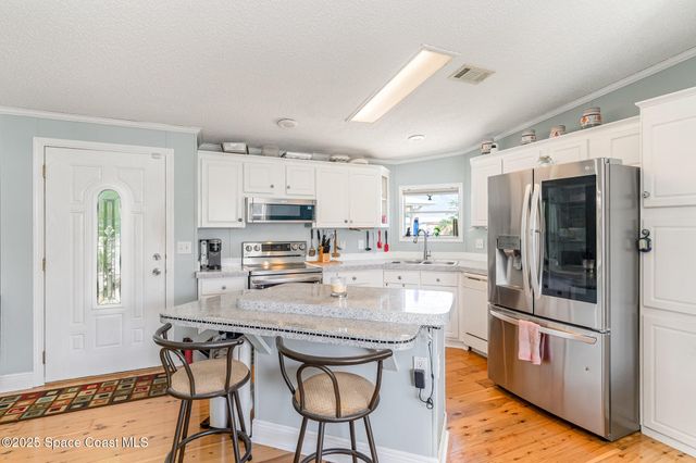 1115 Barefoot Circle, Barefoot Bay, FL 32976