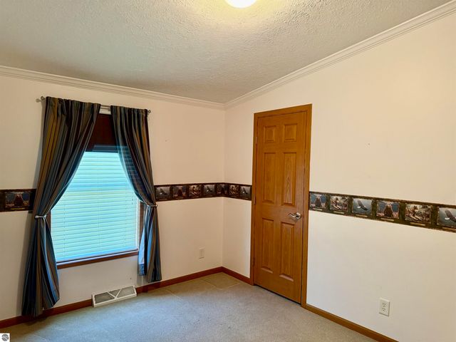 7679 Riverview Drive, St Louis, MI 48880