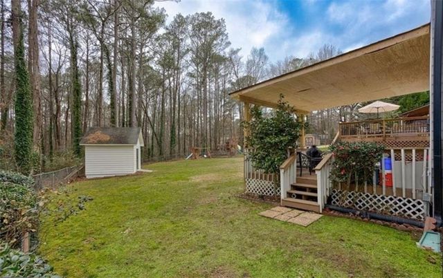 1201 HOLLY HILLS SW Drive, Lilburn, GA 30047