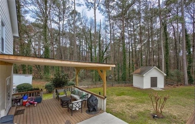 1201 HOLLY HILLS SW Drive, Lilburn, GA 30047