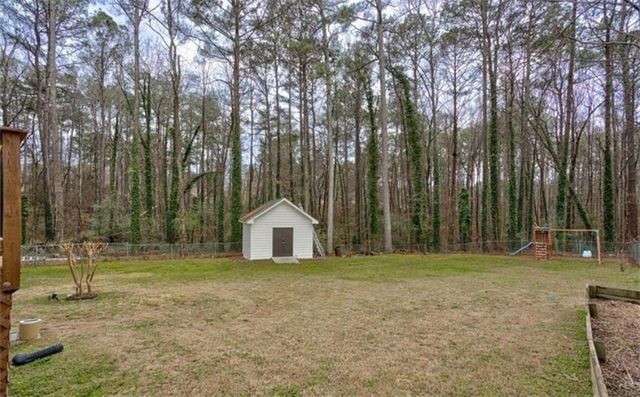 1201 HOLLY HILLS SW Drive, Lilburn, GA 30047