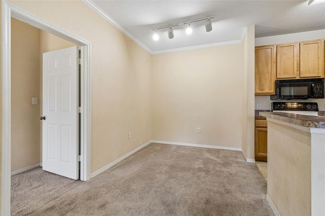 10203 COURTNEY PALMS BOULEVARD 103, Tampa, FL 33619