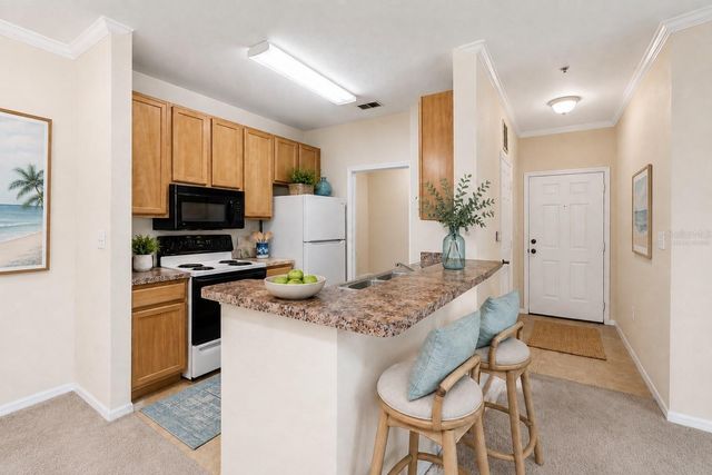 10203 COURTNEY PALMS BOULEVARD 103, Tampa, FL 33619