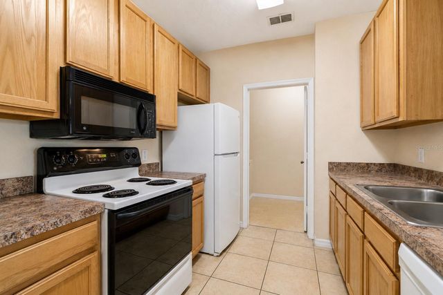 10203 COURTNEY PALMS BOULEVARD 103, Tampa, FL 33619