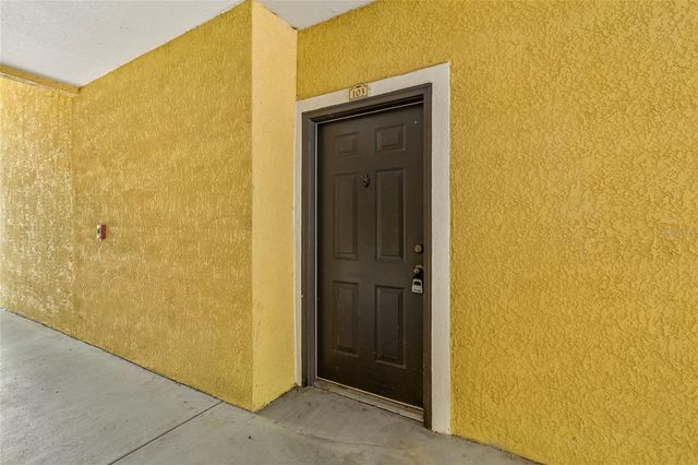 10203 COURTNEY PALMS BOULEVARD 103, Tampa, FL 33619