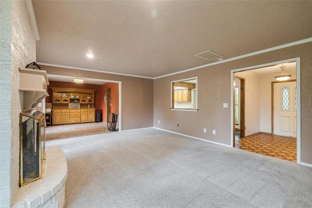 11784 Woodland Hill Drive, Choctaw, OK 73020