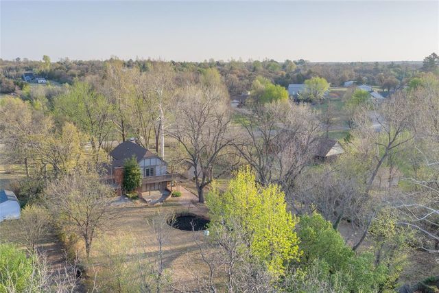 11784 Woodland Hill Drive, Choctaw, OK 73020