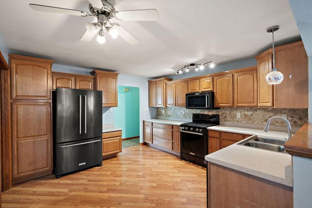 9542 Roosevelt Place, Crown Point, IN 46307