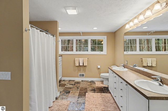 7380 Deepwater Point Road, Williamsburg, MI 49690